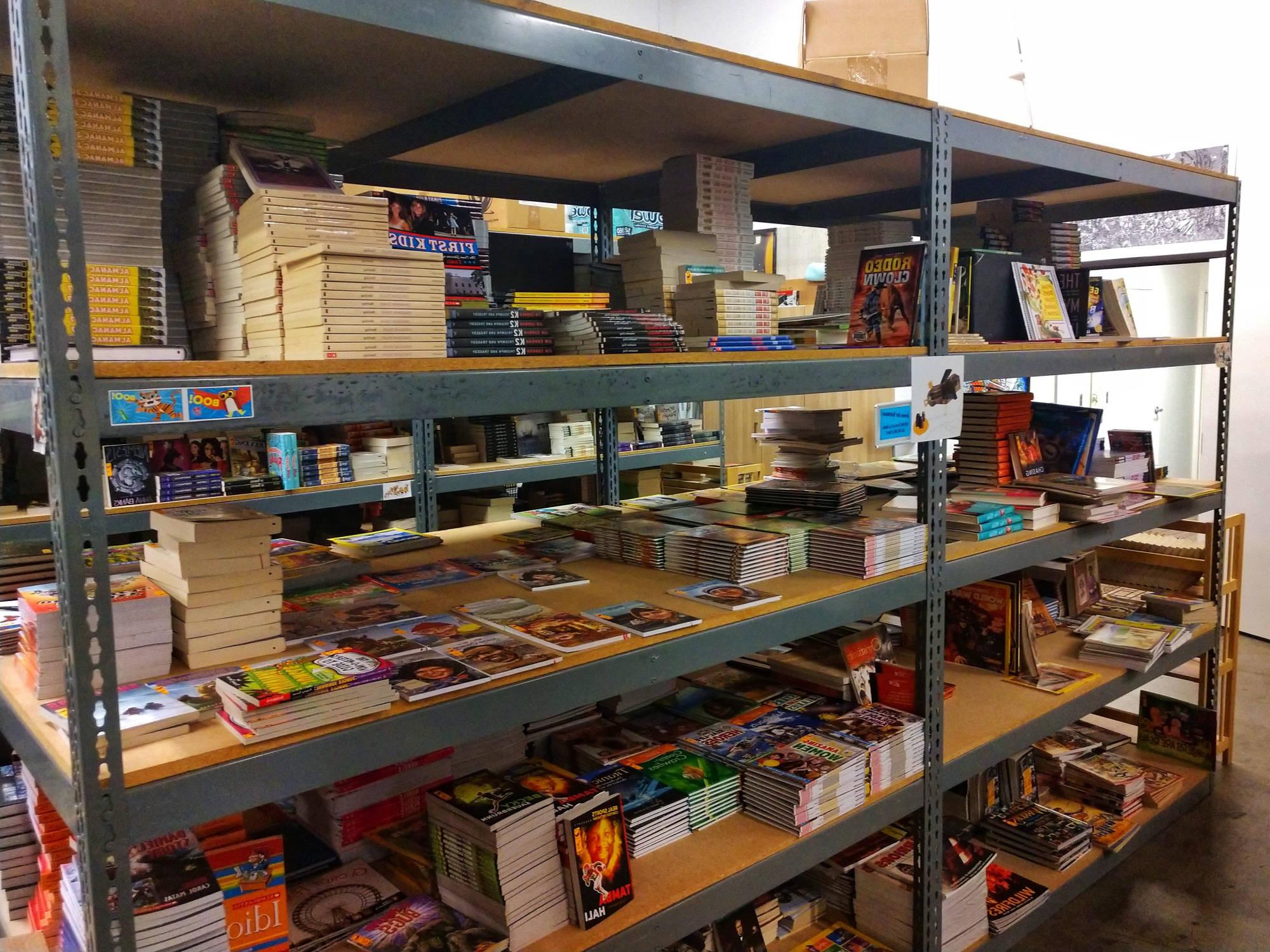 warehouse shelves with non-fiction books